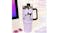 A Kuromi tumbler is placed on the table A Kuromi tumbler is placed on the table