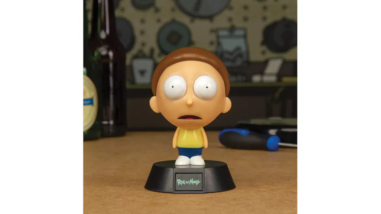 Morty Icon Light turned off, standing on a black base with Rick and Morty logo, displayed on a tabletop Morty Icon Light turned off, standing on a black base with Rick and Morty logo, displayed on a tabletop