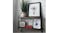 A decorative wall shelf featuring framed art, books, and a potted plant A decorative wall shelf featuring framed art, books, and a potted plant