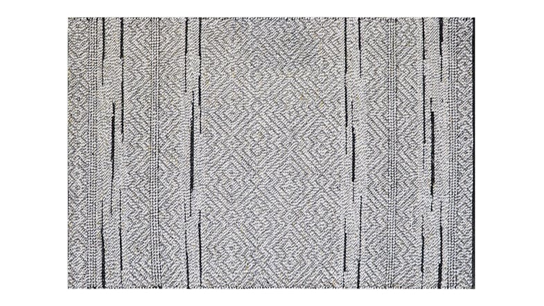 Full view of the Enid Rug in Pebble/Black showing a rectangular shape with a textured weave Full view of the Enid Rug in Pebble/Black showing a rectangular shape with a textured weave