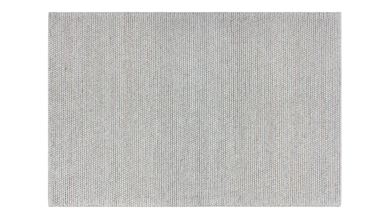 Full view of the Cyrus Rug in Silver colour, showing a rectangular shape with a tightly knotted weave Full view of the Cyrus Rug in Silver colour, showing a rectangular shape with a tightly knotted weave