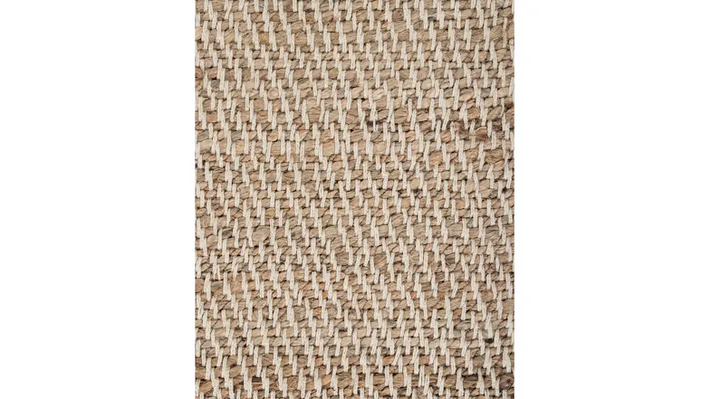 Extreme close-up of a rug weave revealing interlaced natural fibres in beige and tan tones Extreme close-up of a rug weave revealing interlaced natural fibres in beige and tan tones