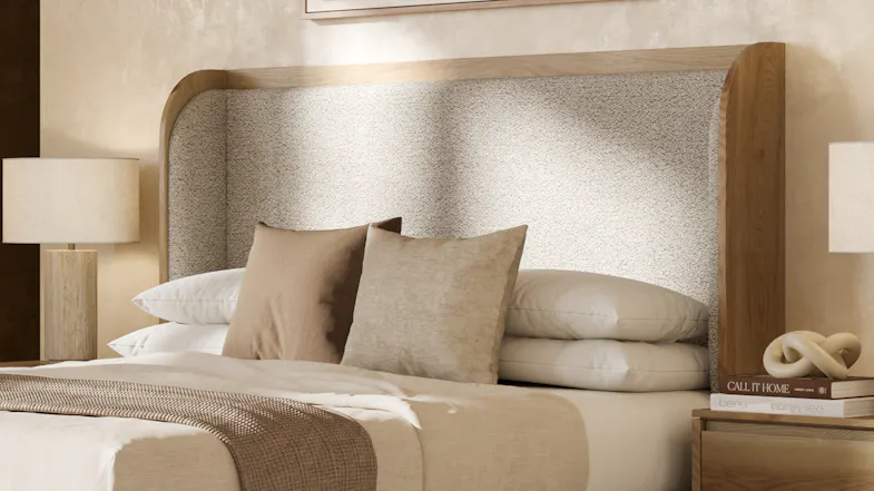 The Fawn King Upholstered Headboard installed over a beautiful bedframe in a warm and inviting bedroom The Fawn King Upholstered Headboard installed over a beautiful bedframe in a warm and inviting bedroom