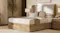 Side angle of the Fawn Bed Frame, highlighting the wooden base's natural knot details Side angle of the Fawn Bed Frame, highlighting the wooden base's natural knot details