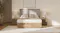 Wide view of a bedroom featuring Fawn Bedside Table next to a wooden bed Wide view of a bedroom featuring Fawn Bedside Table next to a wooden bed