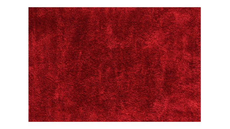Full overhead view of the York Rug in a chilli red shade, showing its soft, uniform shag texture Full overhead view of the York Rug in a chilli red shade, showing its soft, uniform shag texture