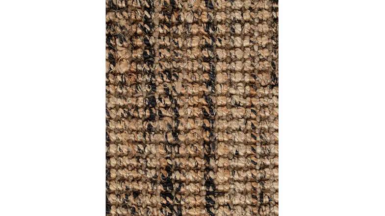 Close-up view of the floor rug with textured black and brown tones Close-up view of the floor rug with textured black and brown tones
