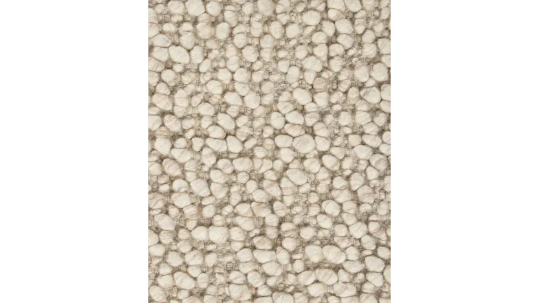 Macro shot of the rug’s surface in neutral pebble shade, emphasising its hand-knotted craftsmanship Macro shot of the rug’s surface in neutral pebble shade, emphasising its hand-knotted craftsmanship