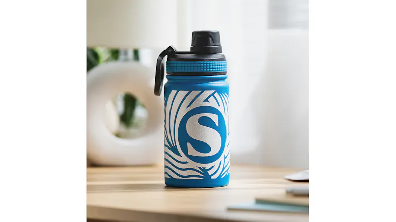 Blue water bottle customised with a patterned vinyl 'S' decal Blue water bottle customised with a patterned vinyl 'S' decal