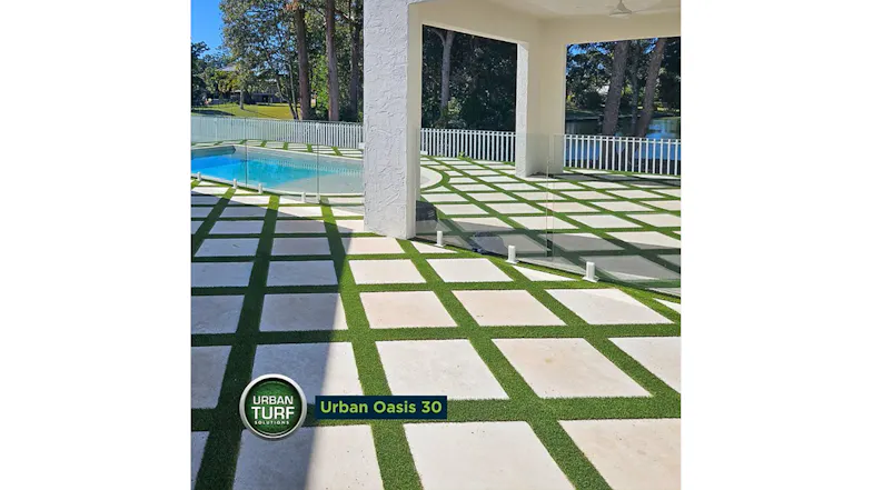 A patio with grid pavers and Urban Oasis 30 turf by the pool A patio with grid pavers and Urban Oasis 30 turf by the pool