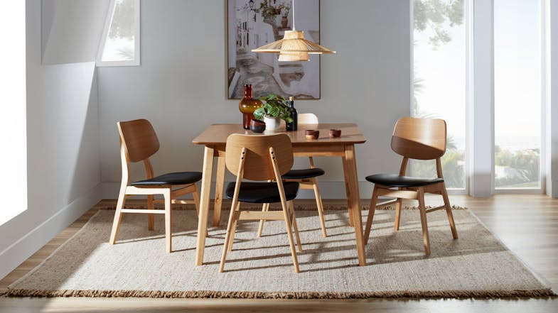 Zara 5-piece dining suite featuring a square wooden table and four chairs with black cushions Zara 5-piece dining suite featuring a square wooden table and four chairs with black cushions