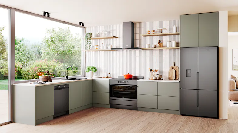 A modern kitchen setting with a built-in dishwasher A modern kitchen setting with a built-in dishwasher