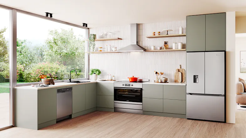 A modern kitchen setting with a stainless steel dishwasher A modern kitchen setting with a stainless steel dishwasher