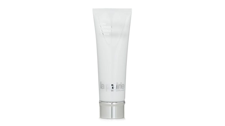 White tube of La Prairie Foam Cleanser with silver cap and brand name printed in metallic letters White tube of La Prairie Foam Cleanser with silver cap and brand name printed in metallic letters