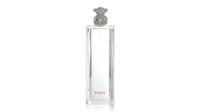 Clear rectangular Tous perfume bottle with silver bear-shaped cap and red logo Clear rectangular Tous perfume bottle with silver bear-shaped cap and red logo