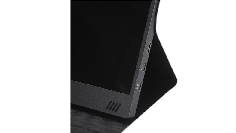 Close-up of a portable monitor showing side ports including HDMI and USB-C connectors Close-up of a portable monitor showing side ports including HDMI and USB-C connectors