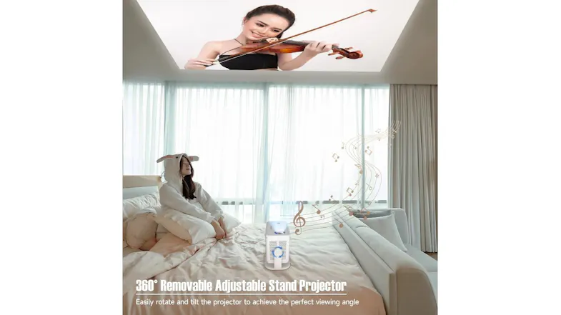 Projector placed on a bed projecting an image onto the ceiling, demonstrating its 360° adjustable stand Projector placed on a bed projecting an image onto the ceiling, demonstrating its 360° adjustable stand