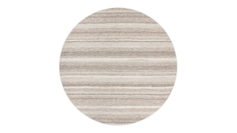 A circular view of the St Ives Outdoor Rug featuring horizontal, multi-tonal charcoal stripes A circular view of the St Ives Outdoor Rug featuring horizontal, multi-tonal charcoal stripes