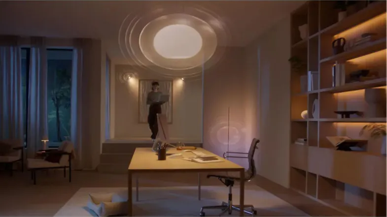 A home office lit with Philips Hue smart bulbs in warm tones A home office lit with Philips Hue smart bulbs in warm tones