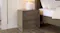 A view of the Carlisle 2 Drawer Bedside Table in a brightly lit bedroom A view of the Carlisle 2 Drawer Bedside Table in a brightly lit bedroom