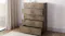 A view of the tallboy with some of its drawers slightly opened A view of the tallboy with some of its drawers slightly opened