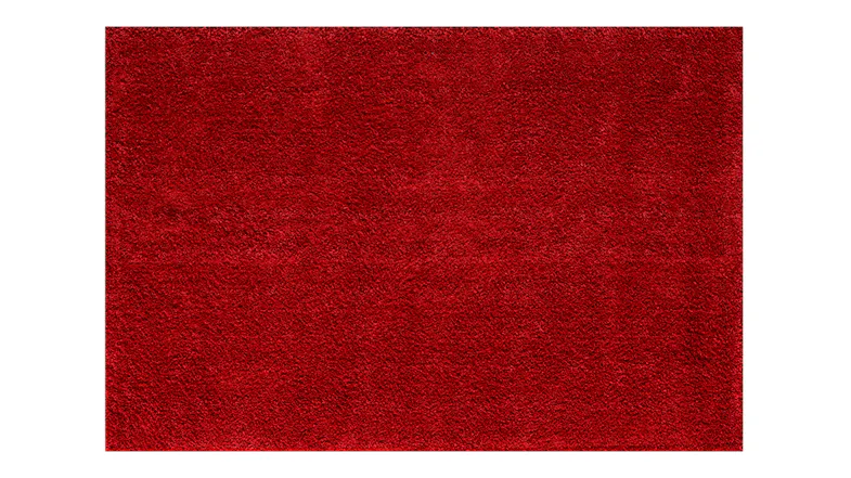 A rectangular Stirling Rug, showing a dense, plush shaggy pile and modern solid-colour red design A rectangular Stirling Rug, showing a dense, plush shaggy pile and modern solid-colour red design