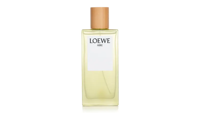 Loewe Aire fragrance bottle with light yellow liquid and wooden cap Loewe Aire fragrance bottle with light yellow liquid and wooden cap