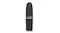 A closed MAC lipstick tube in matte black with silver detailing, standing upright A closed MAC lipstick tube in matte black with silver detailing, standing upright