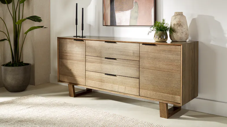 Full front view of the Whitehaven 1800mm 2-door 3-drawer buffet table in a minimalist living room setting Full front view of the Whitehaven 1800mm 2-door 3-drawer buffet table in a minimalist living room setting
