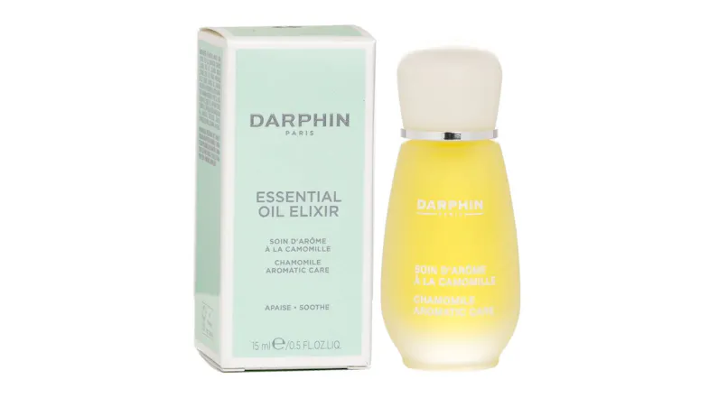 Darphin Chamomile Aromatic Care bottle placed beside its mint-green and white packaging box Darphin Chamomile Aromatic Care bottle placed beside its mint-green and white packaging box