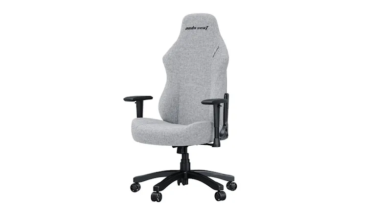 A black ergonomic gaming chair viewed from a front-right angle A black ergonomic gaming chair viewed from a front-right angle