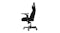 A left side view of an ergonomic black gaming chair A left side view of an ergonomic black gaming chair