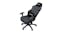 An ergonomic gaming chair reclined at a left angle An ergonomic gaming chair reclined at a left angle
