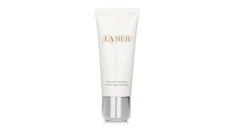 La Mer The Hand Treatment in a white tube with a silver cap, front label shows “LA MER” in green letters La Mer The Hand Treatment in a white tube with a silver cap, front label shows “LA MER” in green letters