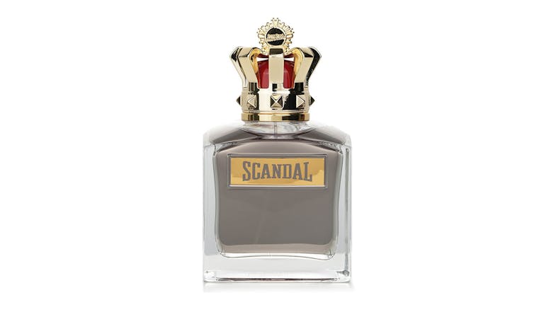 Square glass bottle of Jean Paul Gaultier Scandal perfume with a gold "SCANDAL" plaque Square glass bottle of Jean Paul Gaultier Scandal perfume with a gold "SCANDAL" plaque