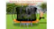 A front view of a 14ft trampoline on a grassy outdoor field A front view of a 14ft trampoline on a grassy outdoor field