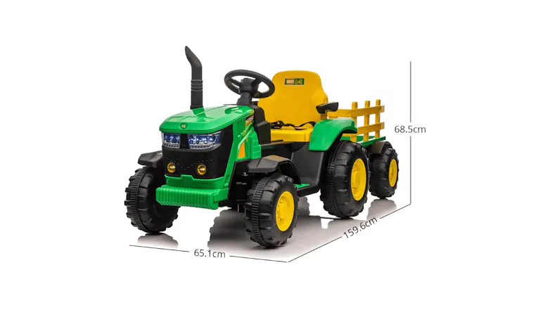 A green and yellow toy TSB tractor with a detachable trailer A green and yellow toy TSB tractor with a detachable trailer