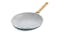 Angled view of a 24cm GreenPan Padova frying pan in smokey blue with a gold-tone handle Angled view of a 24cm GreenPan Padova frying pan in smokey blue with a gold-tone handle