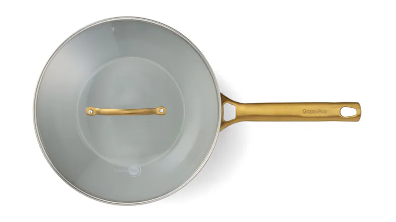 Overhead bird's-eye view of a light blue GreenPan wok with lid Overhead bird's-eye view of a light blue GreenPan wok with lid