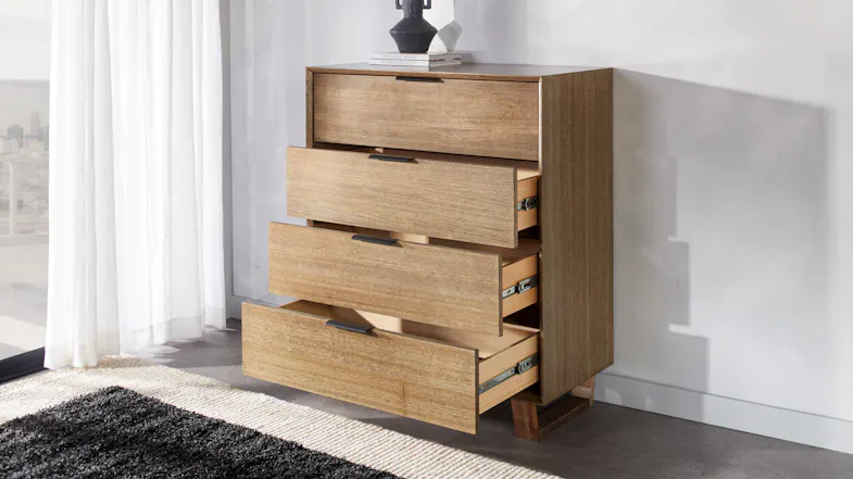 A view of the tallboy with its drawers slightly pulled out A view of the tallboy with its drawers slightly pulled out