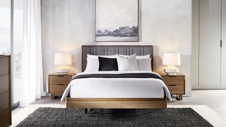 A full front view of the bed frame displayed in a brightly lit bedroom A full front view of the bed frame displayed in a brightly lit bedroom