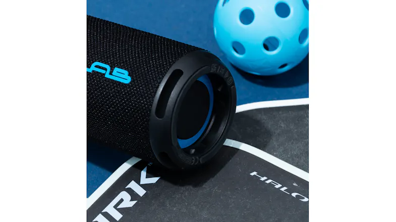 Detail shot of the durable base and blue accents of the JLab Go Party portable speaker Detail shot of the durable base and blue accents of the JLab Go Party portable speaker