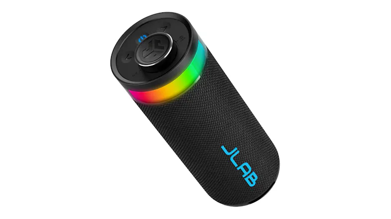 Top-down tilted view of JLab party speaker showing the power button, volume dial, and glowing RGB ring Top-down tilted view of JLab party speaker showing the power button, volume dial, and glowing RGB ring