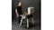 The Everdure Force 11 Barbeque in stone colour shown indoors with the hood open, cooking meat on the grill The Everdure Force 11 Barbeque in stone colour shown indoors with the hood open, cooking meat on the grill