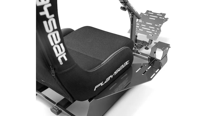 The Playseat Gearshift Holder Pro is installed beside a Playseat racing seat The Playseat Gearshift Holder Pro is installed beside a Playseat racing seat