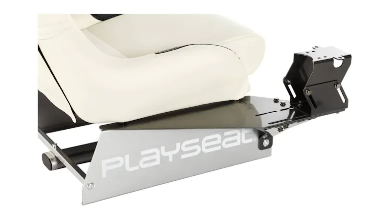 Side view of the Playseat Gearshift Holder Pro attached to a Playseat seat with white upholstery Side view of the Playseat Gearshift Holder Pro attached to a Playseat seat with white upholstery