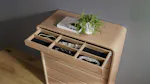 Top drawer of the Arc Tallboy open, revealing a black felt-lined jewelry organiser Top drawer of the Arc Tallboy open, revealing a black felt-lined jewelry organiser