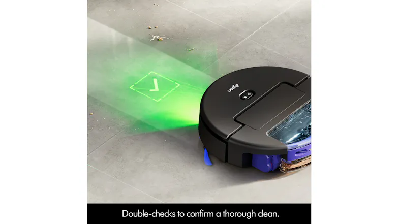 Dyson robot vacuum confirming a spot is cleaned using green light feedback Dyson robot vacuum confirming a spot is cleaned using green light feedback