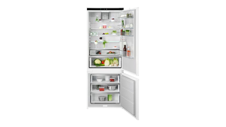 Frontal view of the stocked refrigerator showing various glass door bins Frontal view of the stocked refrigerator showing various glass door bins