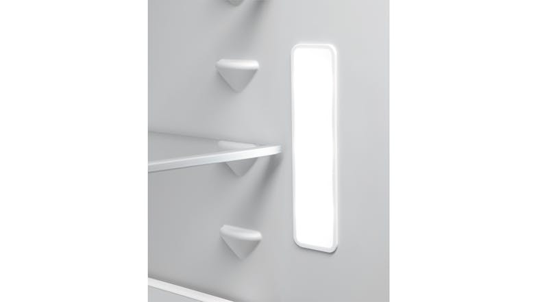 Close-up of a vertical, bright LED light panel on the refrigerator interior Close-up of a vertical, bright LED light panel on the refrigerator interior